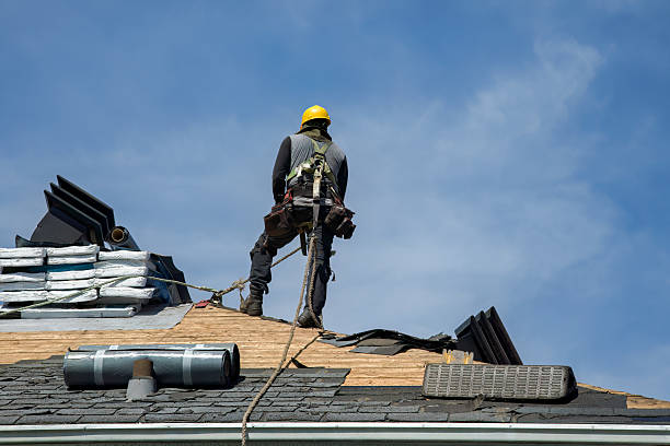 Professional Storm Damage Roof Repair technician working in Westford, MA